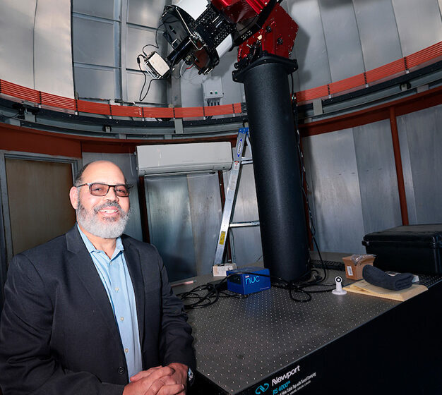 Professor Oneal with Telescope