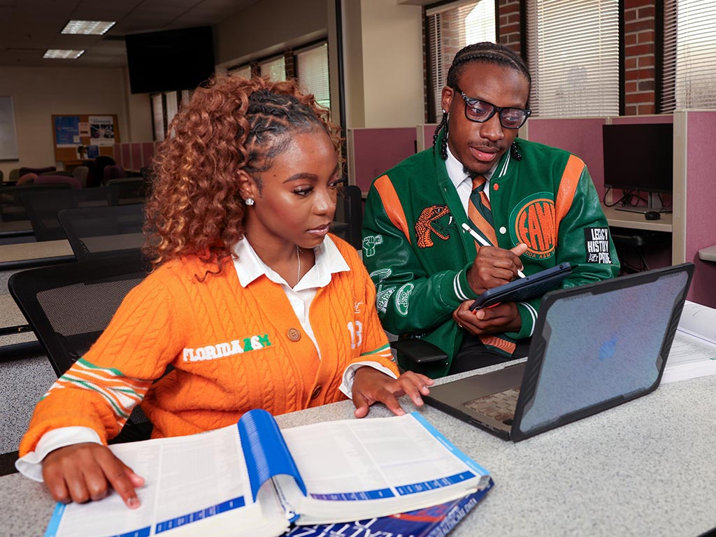Students studying in library