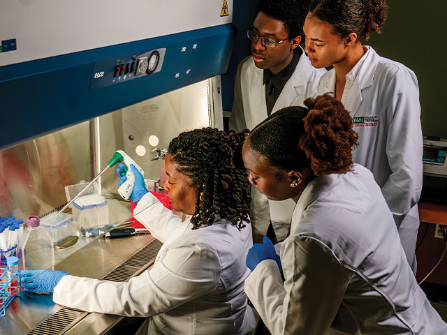 Dr. Pope with students