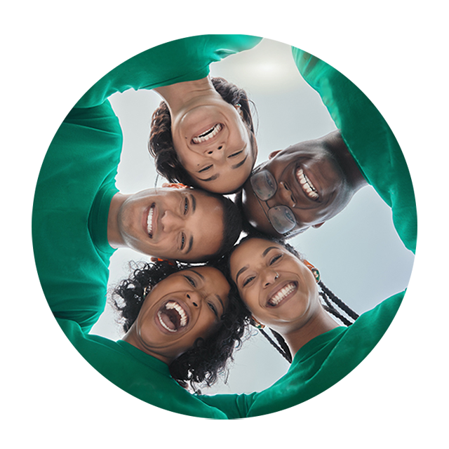 "Save the date" sign displayed prominently on a vibrant orange brick wall, creating a striking visual announcement.