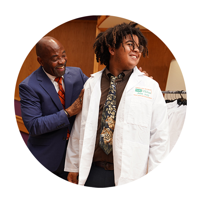 "Save the date" sign displayed prominently on a vibrant orange brick wall, creating a striking visual announcement.