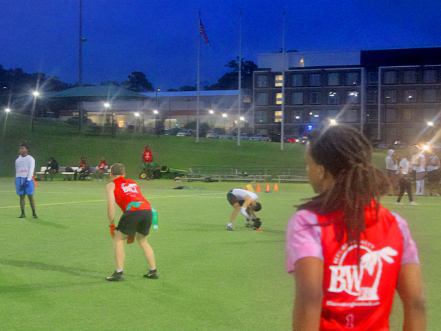 Students playing flag football