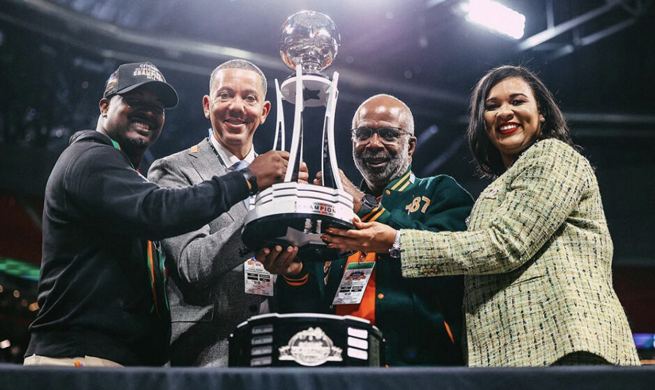 Celebration bowl trophy with Simmons, Robinson, and Sykes