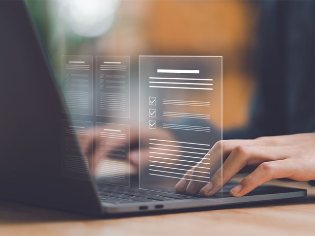 Woman typing on computer