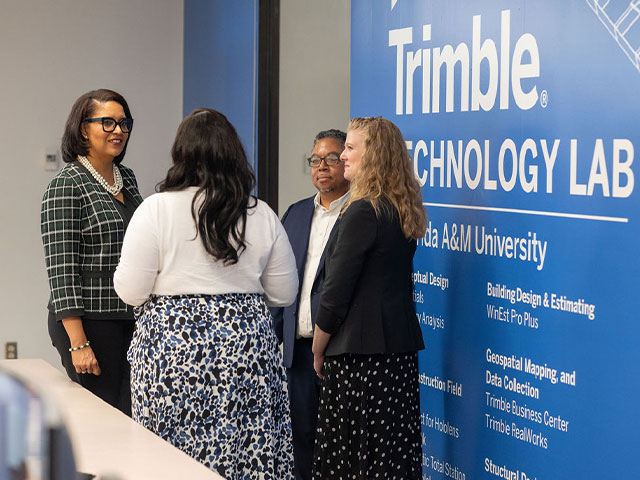 Provost Watson and Dean Chin meeting with the Trimble Tech Lab Team