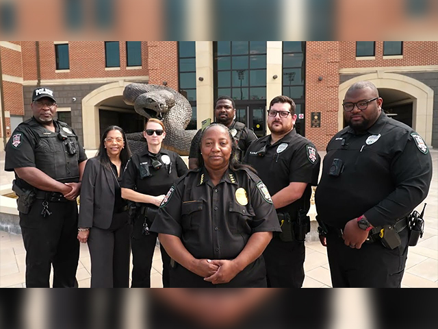 FAMU officers standing in line behind Chief Audrey Alexander