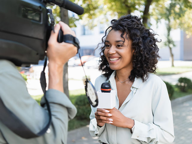 News anchor talking to camera