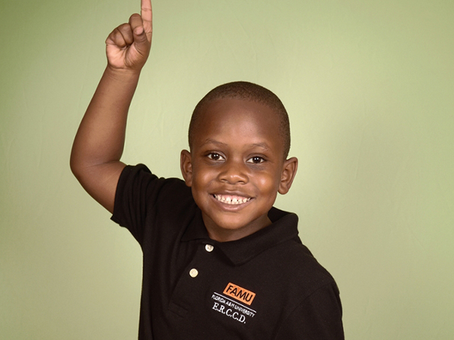 Smiling ERCCD child in uniform