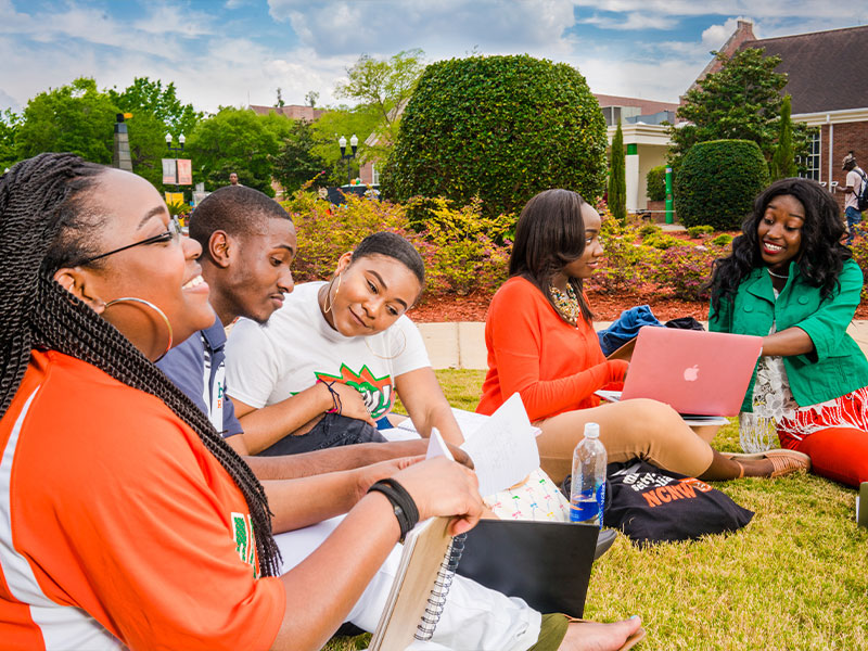 Students sitting at the Quad