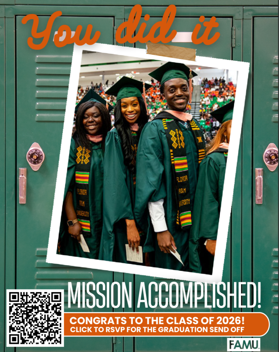 3 graduates in cap and gown smiling