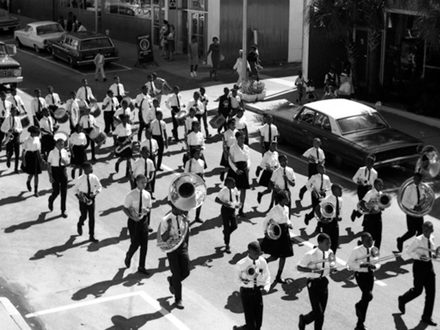 Float in the FAMU homecoming parade. The Sign at front of car reads, "Miss Pre-Med. 1965-66"